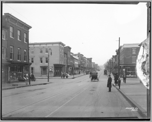 Baltimore Street, 900 block west, looking east, 1920, Hughes Company, MdHS, MC6284. A sign for the New Aladdin Theater is visible in the center of the photograph.
